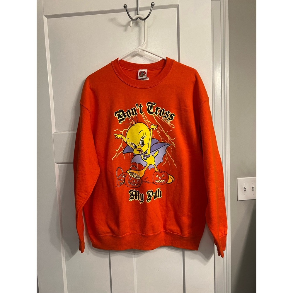 Warner Bros Orange Sweatshirt with Cartoon Graphic